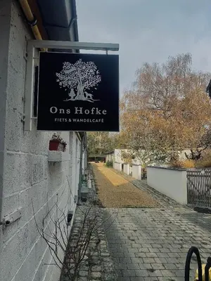 a sign on the side of a building at Ons Hofke in Lubbeek