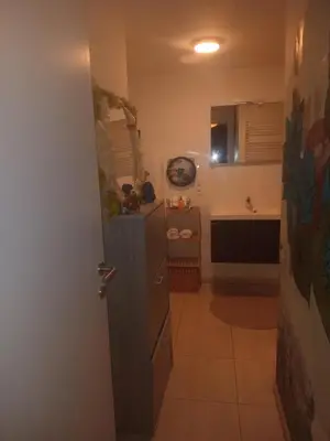 a small kitchen with a sink and a counter at Gallery Home in Brussels