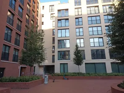 a large apartment building in a city at Gallery Home in Brussels