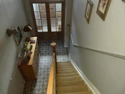 a view of a stairway with a door and a stair case at Guesthouse Alizée in Leuven