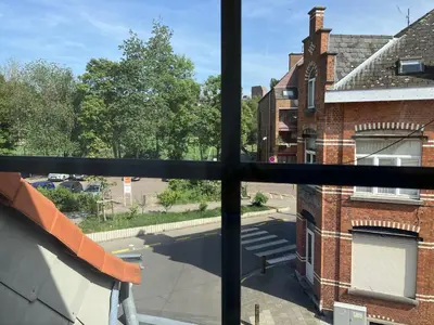 a view of a street from a window at La Maison des Sources in Brussels