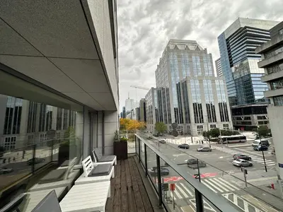 a balcony of a building with a view of a city at 3 Bedroom Apartment in City Center with Balcony View in Brussels