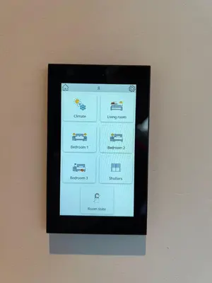 a picture of a tablet on a wall at ApartHotel Dénia in Lochristi