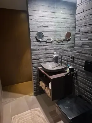a bathroom with a sink and a mirror at B&B Finis terrae in Lokeren