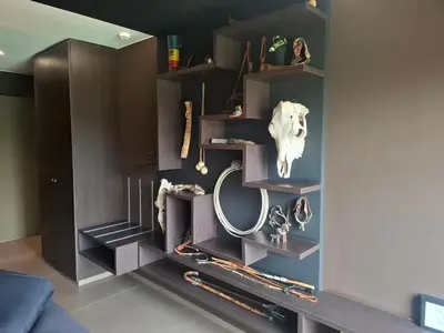 a room with shelves with a mirror in it at B&B Finis terrae in Lokeren