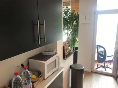 a kitchen with a white microwave on a counter at Bruxelles in Brussels