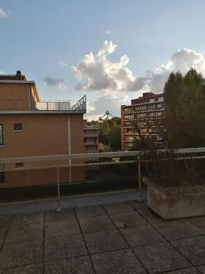 a view from the roof of a building with buildings at nys willy in Grimbergen