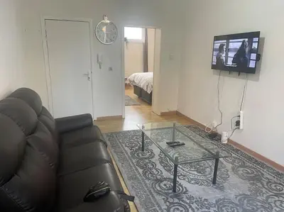 a living room with a couch and a coffee table at Bruxelles in Brussels