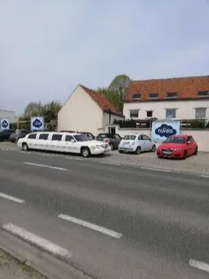 a group of cars parked on the side of a street at Nuvola ULTIMO Resort in Zottegem
