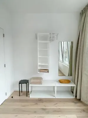 a white desk in a room with a mirror at #2800ourhome 301 in Mechelen