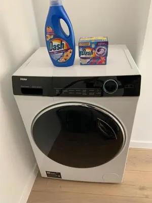 a microwave with a box of cereal and a pair of scissors at #2800ourhome 202 in Mechelen