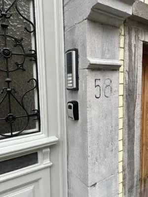 a house with a door with the number on it at Cosy Nest in Brussels