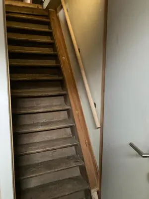 a set of stairs in a room at Gastroatelier in Gooik