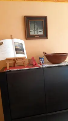 a counter with a wooden bowl on top of it at Feel at home in Leuven in Leuven