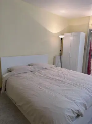a bedroom with a large bed in a room at Appartement à Bruxelles Midi - Grand place Bruxelles in Brussels