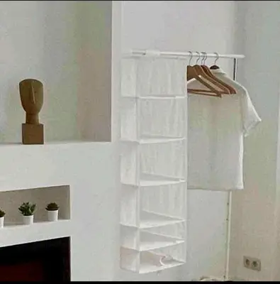 a white towel rack with white towels on it at Sublime appartement Calme Cosy & Jacuzzi in Brussels