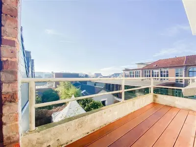 a balcony with a view of a building at Plein centre de Waterloo! 2 in Waterloo