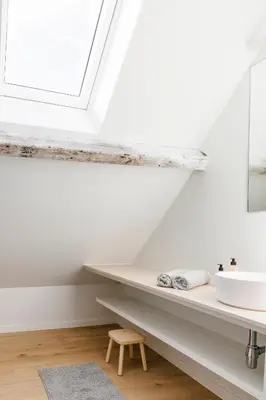 a bathroom with a sink and a window at High-end flats at South area in Antwerp