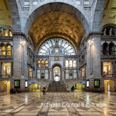 a large building with stairs and a large window at Private studio in Antwerp in Antwerp