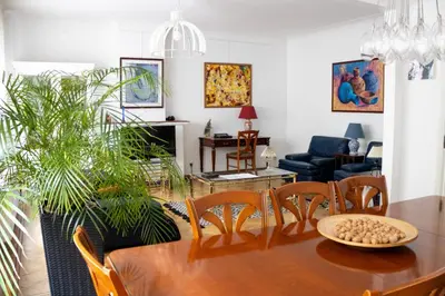 a living room with a dining room table and chairs at Elegance ,Space & Luxury in Brussels in Brussels