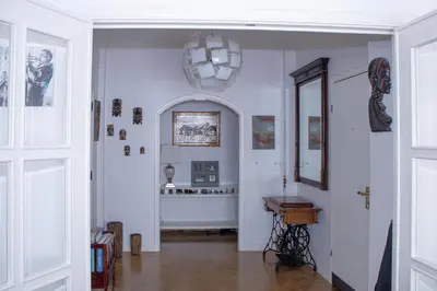 a room with a hallway with a table and a chandelier at Elegance ,Space & Luxury in Brussels in Brussels