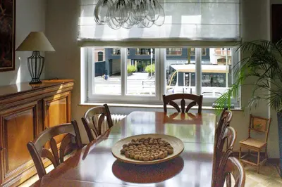 a dining room table with a bowl of food on it at Elegance ,Space & Luxury in Brussels in Brussels