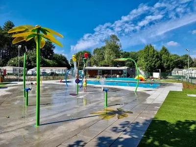 a park with a water park with a pool at Vakantiepark Breebos: Empty Lots for tents and mobile homes in Rijkevorsel