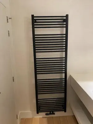 a black and white shelf in a closet at Business Accommodation Luxury Loft in Geel