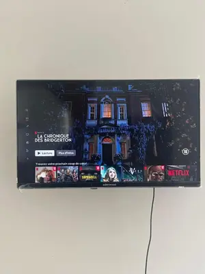 a tablet screen with a picture of a house at cantillonn in Brussels
