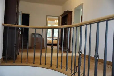 a spiral staircase in a house at Edville Home in Ghent