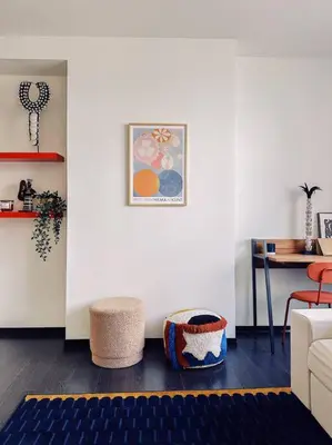 a living room with a couch and a table at Historic Center Apartment Walk to Everything in Ghent