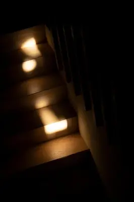 a staircase in a dark room with lights at Nuit Blanche in Oud-Heverlee