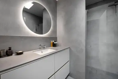 a bathroom with a sink and a mirror at Nuit Blanche in Oud-Heverlee