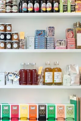 a refrigerator filled with lots of food and drinks at Hotel des Galeries in Brussels