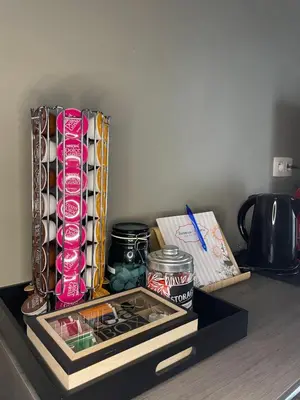 a shelf with a box of food on a counter at Chez Auguy et Deborah in Antwerp