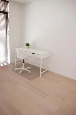 a white desk with a potted plant on it in a room at Brand New Apartment Sint-niklaas in Sint-Niklaas