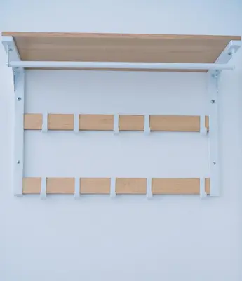 a set of shelves with wood at Appartement vlakbij Antwerpen centrum! in Antwerp