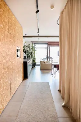 a living room with a couch and a table at The Banker Antwerpen - Free Parking in Antwerp