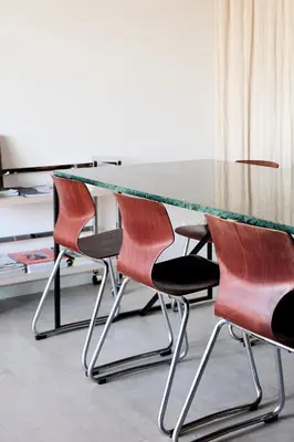a conference table with four chairs around it at The Banker Antwerpen - Free Parking in Antwerp