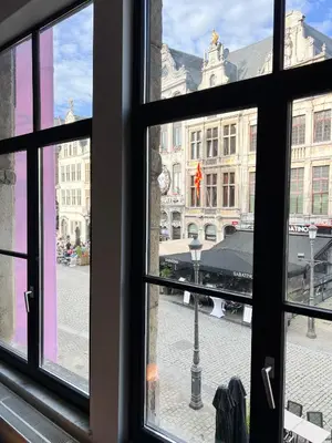 a view of a city from a window at Cosy Appartement Nammos 1 - 4 p in Antwerp