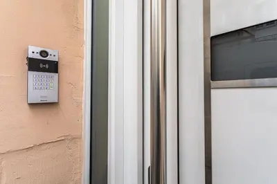 a door with a sign on the side of a building at Studio2 Van Lerius in Antwerp
