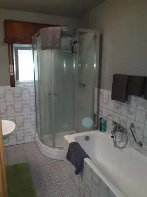 a bathroom with a shower and a bath tub at Wenceslas Cobergher IV in Bertem
