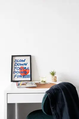 a white desk with a picture on top of it at The ASH in Antwerp