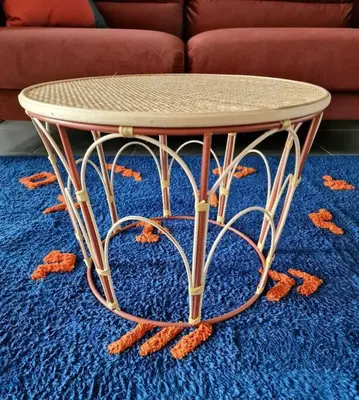 a round table on a blue rug with a couch at Hakuna Matata @ Opera in Antwerp