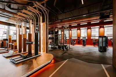 a large room with a gym with a lot of equipment at SLEEP INN - Palace Apartments - 2 Bedrooms in Antwerp