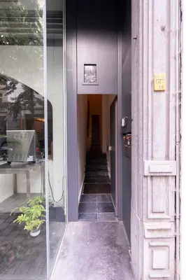 a hallway of a building with a stair case at SHWAY - The Handshake House in Antwerp