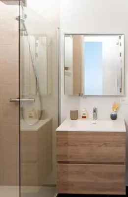 a bathroom with a sink and a shower at The Wonder Shore in Antwerp