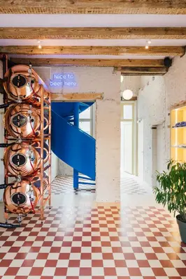 a tasting room with a rack of wine bottles at Hopspot in Evergem