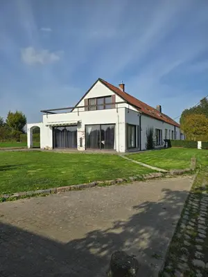 a large white house with a lot of windows at White House in Ternat