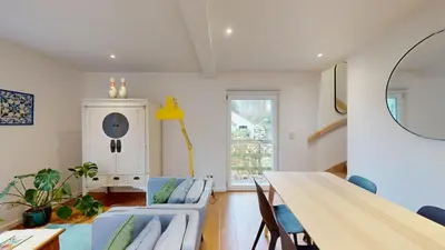 a dining room with a table and chairs at The Tile House - 2 bedroom property just south of Brussels in Sint-Genesius-Rode